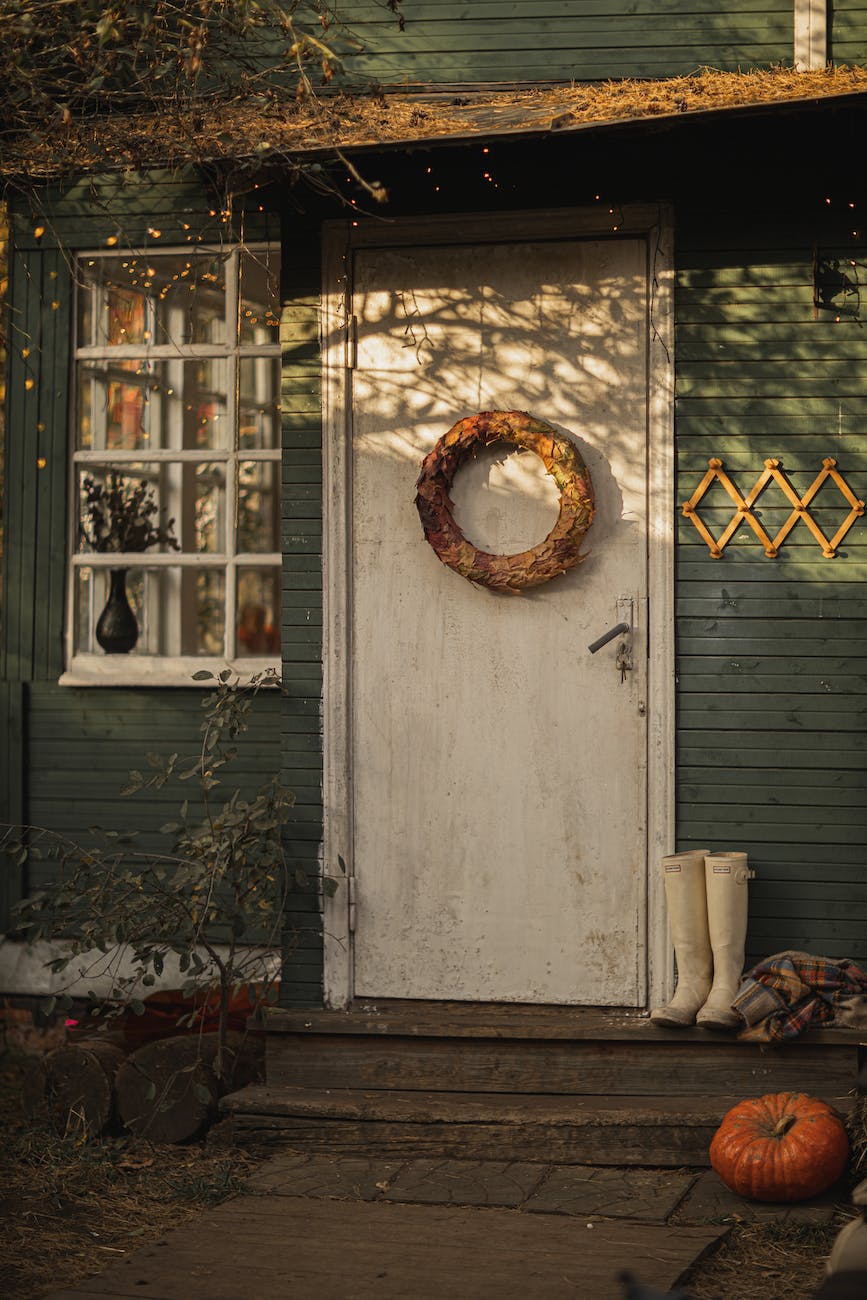 white wooden door with a wreath